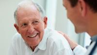 Male patient speaks with doctor